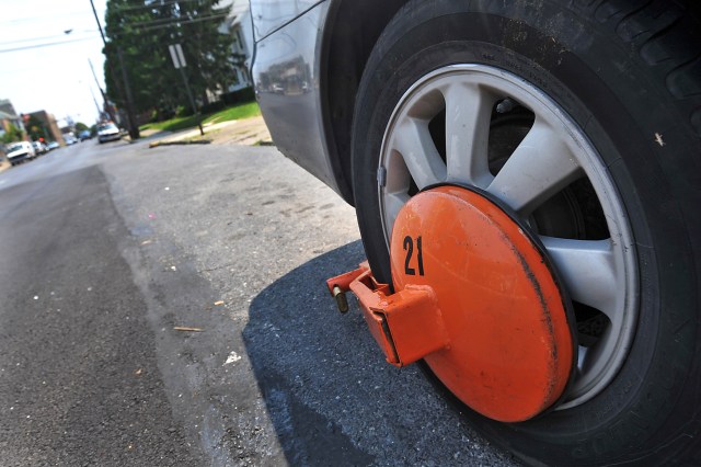 ask-a-real-estate-pro-booting-car-traps-second-vehicle-in-garage-in-an-emergency-are-hoa-and-towing-company-liable-2, 2194395,